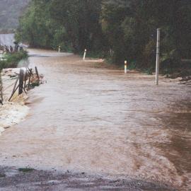 Flood, Karapoti; water crossing the road; seen from the bridge?