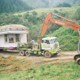 House relocation; from 10 Parliament St, Lower Hutt, to Karapoti 11; larger unit.