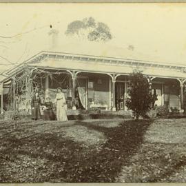 Unidentified house and women