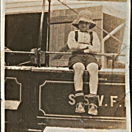 Frederick Goodland [?] Sitting on Silverstream Volunteer Fire Brigade Appliance; ca. 1931