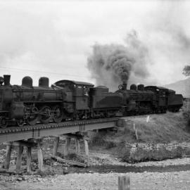 A-class 4-6-2 locomotives with goods train in the Mangaroa Valley - 1950s.