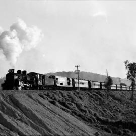 Locomotives A-601 and De-509 with special train; climbing from Upper Hutt - October 1954.