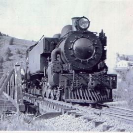 Wab-class locomotive No. 797 with work train; crossing Silverstream bridge - c1950.