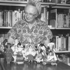 Audrey Harper and dolls for display in children's library.