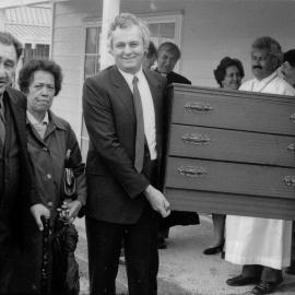 Rental housing, corner of Fergusson Drive and McHardie Street; arrival of first tenants.