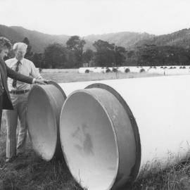 Te Marua; Macaskill water storage lakes;  Bill Jeffries, MP, and Regional Council project engineer Tony Griffiths with pipes for internal connections.