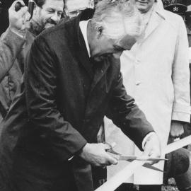 River Road opening; Governor-General Sir Paul Reeves cuts the ribbon; Bill Jeffries, M P, inbackground