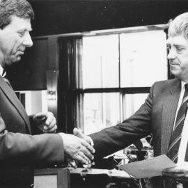 Rotary president Brian Kerr and Golder Homestead Museum Society fundraising manager Gary Cooper.