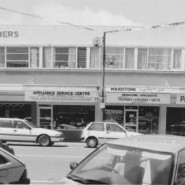 Main Street, 1997, south side; No. 204-212; Head Case (210); Upper Hutt Electrical (208); Maidstone Engravers (206); Labour electorate office (204), Paul Swain, M P.
