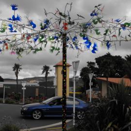 Street art; corner of Main Street and Pine Avenue; fantail tree.