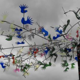 Street art; corner of Main Street and Pine Avenue; fantail tree details.