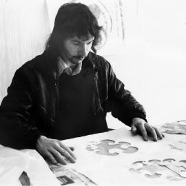 Probation Service arts and crafts course; Michael cutting stencils for screen-printing fabrics.