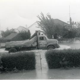 Flood, 1963; view from 32 Moonshine Road, with truck passing.