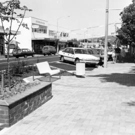Main Street, west end; new paving and seating, seen from the western corner of Pine Avenue.