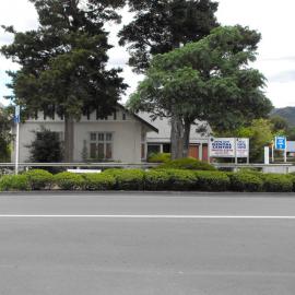 Main Street, north side; No.  19-21(?); corner of Royal Street