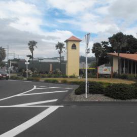 Pine Avenue west side 1; St Joseph's Catholic Church belltower and entry end.