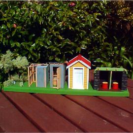 Scale model buildings; 'memorable longdrops'.
