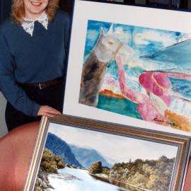 Upper Hutt City calendar for 1997; Information Centre's Paula Tie with two selected artworks