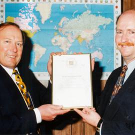 Acma Industries; managing director receives Tradenz award from Peter McCardle, M P.