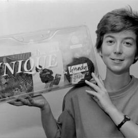 Upper Hutt Leader staff; journalist Georgina Hall with a New Zealand Wool Board promotion package.