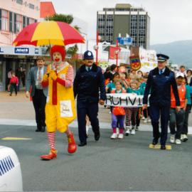 School crossing children's parade 1993 in Main Street, with 'Ronald McDonald'.