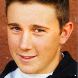 Water skiing; barefoot skier Jason MacArthur, 14, now New Zealand champion.