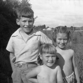 John, Catharine and Susan Haxton, (Maymorn Camp in distance), c1952-53