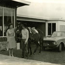 Stella Jackson and daughter Lynne  with horse, 1961