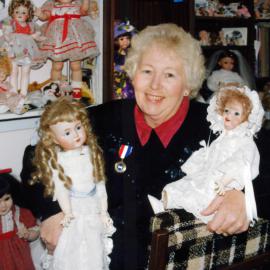 Val Anthony gains Master's in Dollmaking degree from International Doll Artisan Guild. 