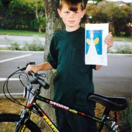 Te Omanga Hospice Christmas card designed by Aaron Scott; top prize a bike.