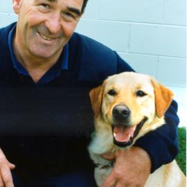 Police Dog Training School; Peter Menzies with the first arson-detecting dog.