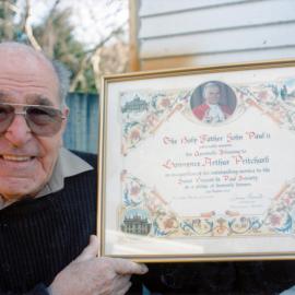 Larry Pritchard receives papal blessing for work with Saint Vincent de Paul Society.
