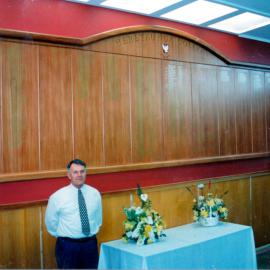 Heretaunga College buldings; principal Brian Robb with new honours board from reunion funds.