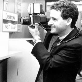 Simon Woolf, photographer, succeeds his father, Ronald, killed in a helicopter crash in November 1987.