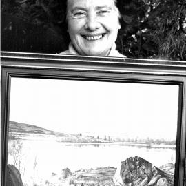 June Brundson, with her 'Winter Reflections, Lake Tekapo'; included in the Arthritis Foundation 's annual exhibition.