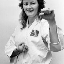 Jeannie O'Donnell, pricing analyst at General Motors, earns Taekwon Do black belt.
