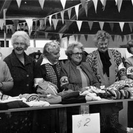 Red Cross clearance sale of winter clothing, to make room for summer stock.