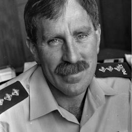 Police Inspector Bill Dunn; area commander.