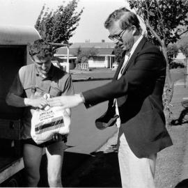 John Clemens delivers fruit and bread with milk to Bill Hodge; 1988