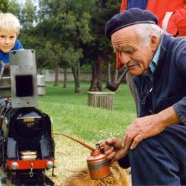 Andrew Brownlow, 5 with Philip Davis and his scale-model Evening Star, Maidstone Park.