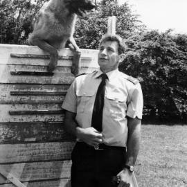 Police dog championships; Contstable Jim Donald and Taz, from Auckland, at the high jump.