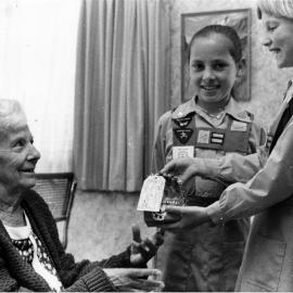 Sandrick Rest Home, Whakatiki Street; resident Vera O'Brien, Brownies Sarah Gammie, Christina Henry.