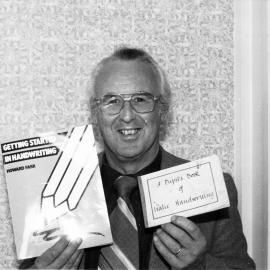 Upper Hutt Primary School principal Howard Farr wth new book 'Getting Started in Handwriting' and earlier one on italic handwriting.