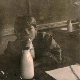 Te Marua School; boy drinking milk; circa 1955