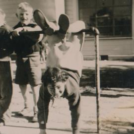 Te Marua School; Child Playing on Monkey Bars; Circa 1955