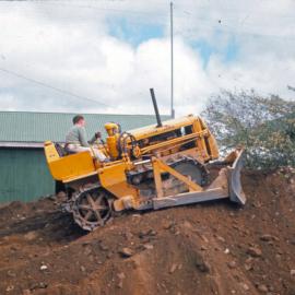 Montgomery Road, later extended westward, forming a crescent; bulldozer