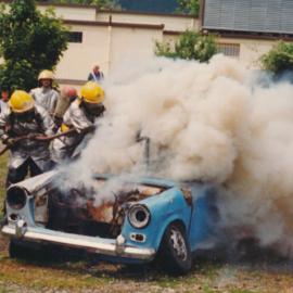 Silverstream Volunteer Fire Brigade; fire-fighting demonstration at Trentham; circa 1990s; car fire 3