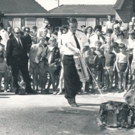Silverstream Volunteer Fire Brigade; new station opening; November 1974; Mike Day demonstrating a fire extinguisher