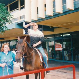 Frankie Stevens on a horse, Main Street; ca 1990s