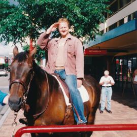 Nick Tansley on a horse; Main Street; ca 1990s
